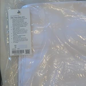 Lulu Lemon, white abc pant slim fit 34/34